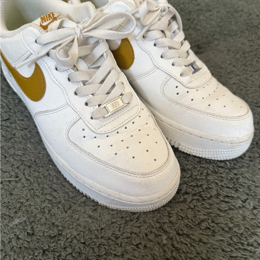 Nike White and Gold Athletic Shoes